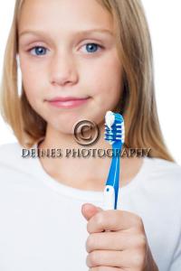 female portrait with toothbrush
